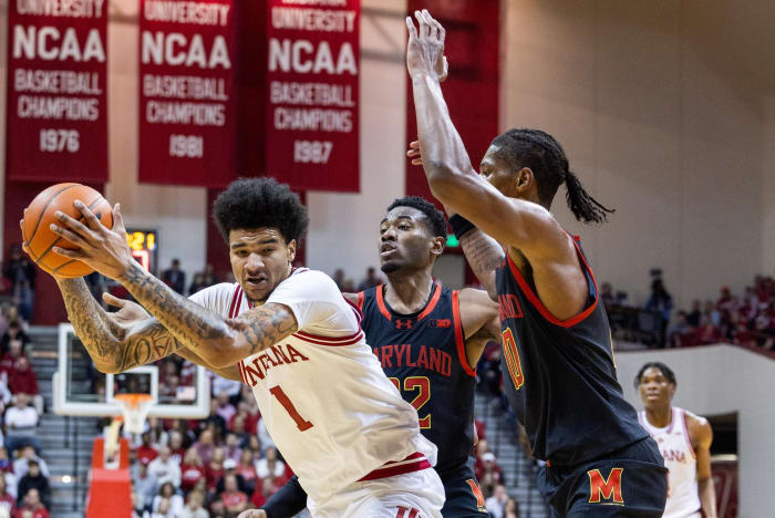 Indiana Hoosiers center Kel'el Ware (1) move to shoot the ball while Maryland Terrapins forward Jordan Geronimo (22) and forward Julian Reese (10) defend in the first half at Simon Skjodt Assembly Hall.